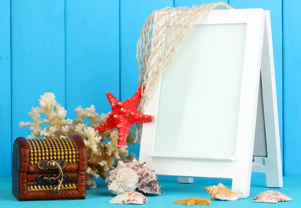 White photo frame for home decoration on blue background — Stock Photo, Image