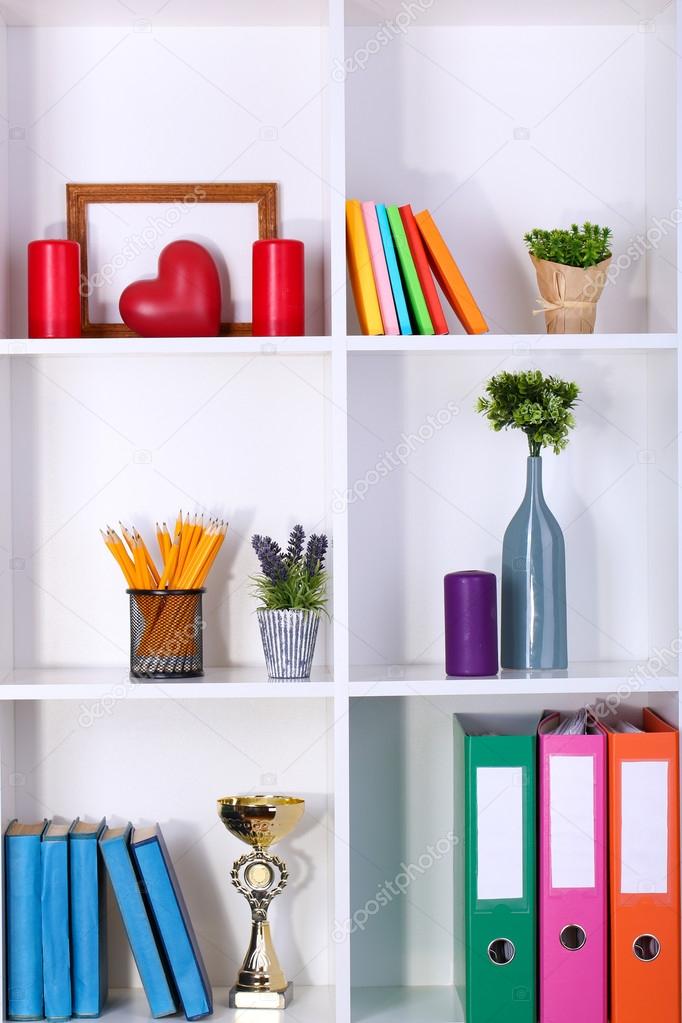 Beautiful white shelves with different home related objects