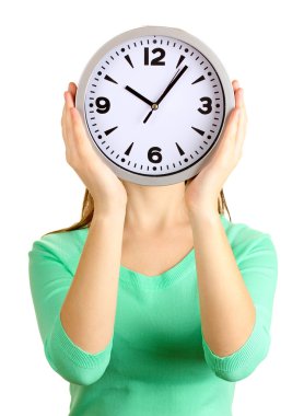 Kız holding saatin üzerinde beyaz izole yüz üzerine