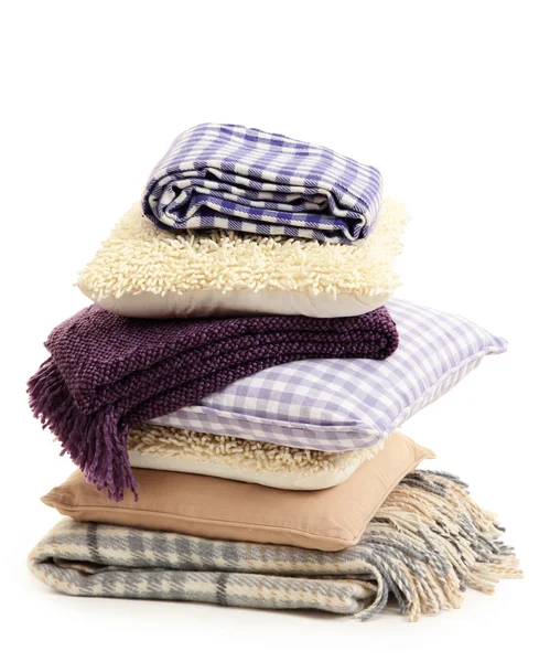Hill colorful pillows and plaids isolated on white — Stock Photo, Image