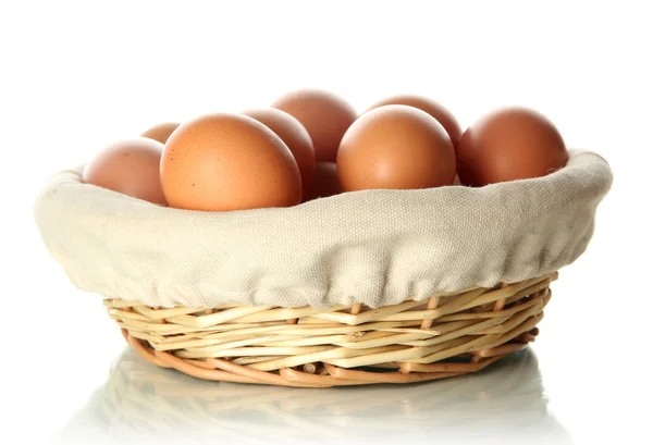 Many eggs in basket isolated on white — Stock Photo, Image