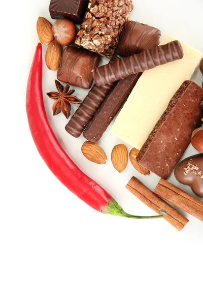 Chocolate e doces isolados em branco — Fotografia de Stock