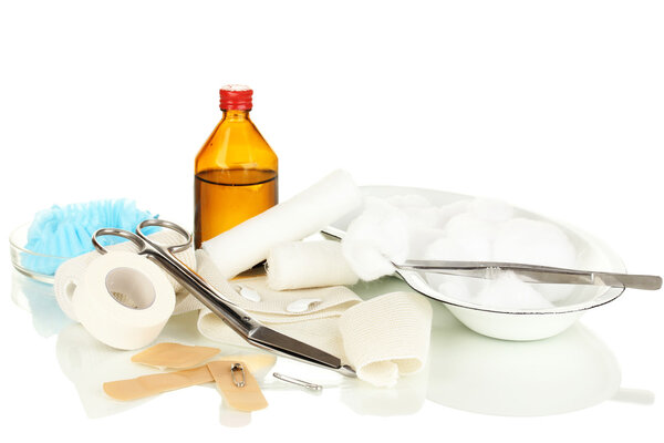 First aid kit for bandaging isolated on white