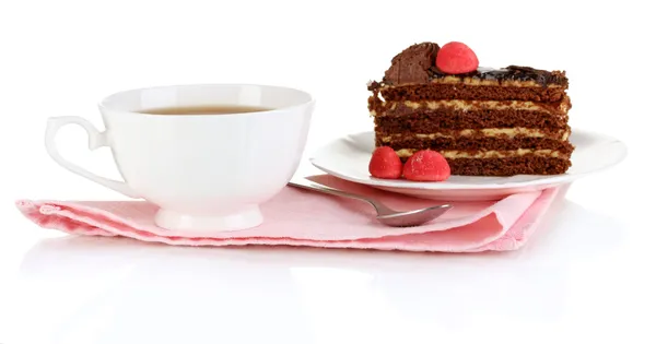 A cup of tea and delicious cake isolated on white — Stock Photo, Image