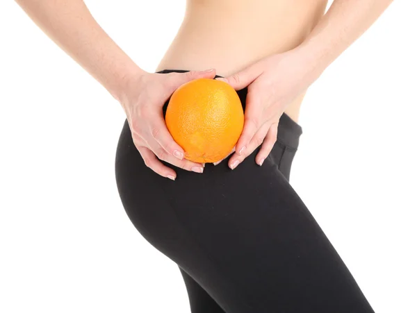 Beautiful female figure with orange isolated on white — Stock Photo, Image