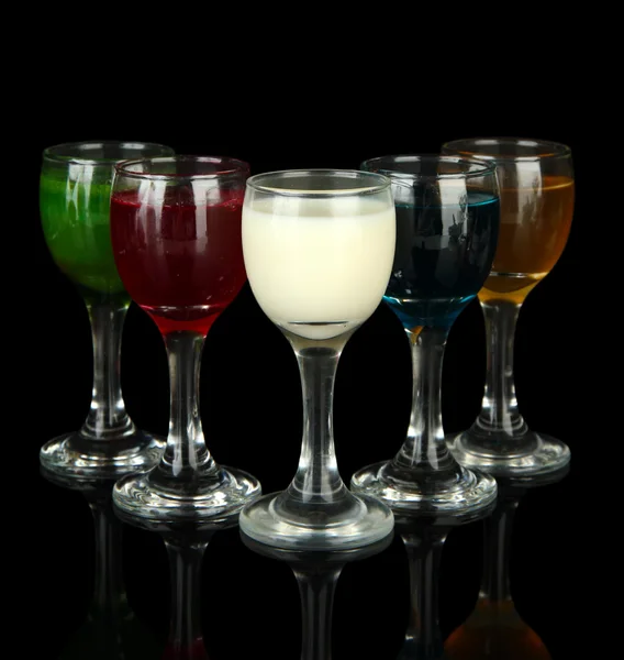 Tasty color liquors, isolated on black — Stock Photo, Image