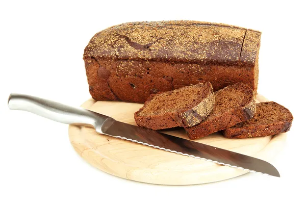 Sliced black bread and knife on wooden board isolated on white — Stock Photo, Image