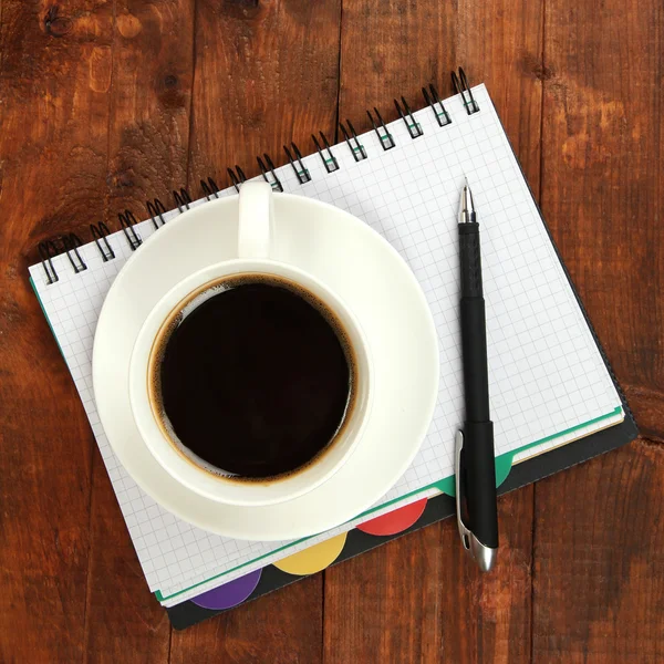 Cup of coffee on worktable close up — Stock Photo, Image