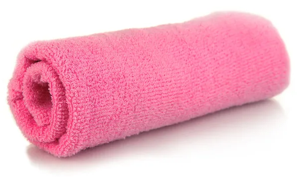 Aufgerolltes rosa Handtuch isoliert auf weißem Grund — Stockfoto