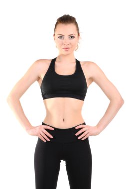 Beyazlar üzerinde izole edilmiş spor yapan genç bir kadın.