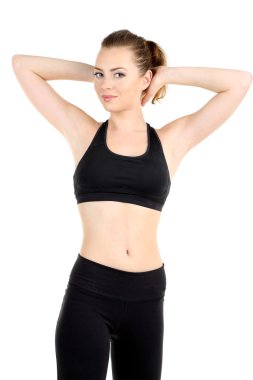 Beyazlar üzerinde izole edilmiş spor yapan genç bir kadın.