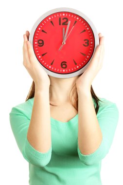 Kız holding saatin üzerinde beyaz izole yüz üzerine