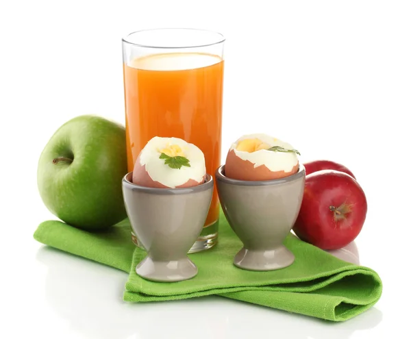 Light breakfast with boiled eggs and glass of juice, isolated on white — Stock Photo, Image