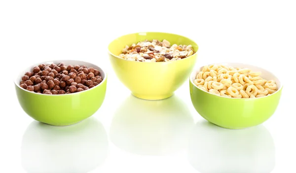 Delicioso y saludable cereal en cuencos aislados en blanco — Foto de Stock