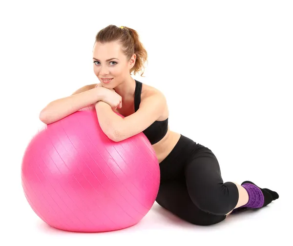 Young woman with gym ball isolated on white — Stock Photo, Image