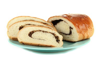 somun ile üzerine beyaz izole renkli plaka üzerinde haşhaş tohumu