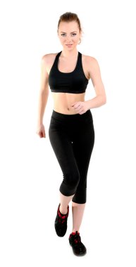 Beyazlar üzerinde izole edilmiş spor yapan genç bir kadın.