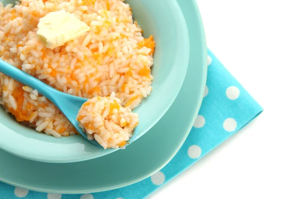 Pruebe la papilla de arroz con calabaza en un tazón azul, aislado en blanco — Foto de Stock