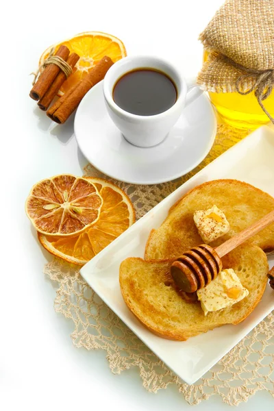 Pain grillé blanc avec du miel et une tasse de café, isolé sur blanc — Photo