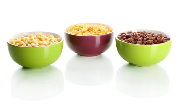 Delicioso y saludable cereal en cuencos aislados en blanco —  Fotos de Stock