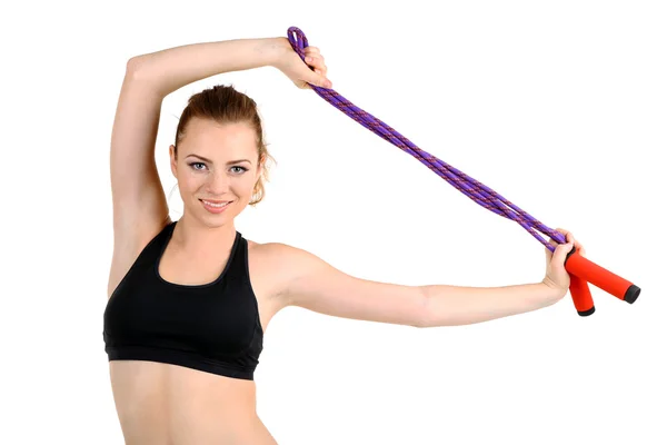 Mujer joven con saltar la cuerda aislada en blanco —  Fotos de Stock