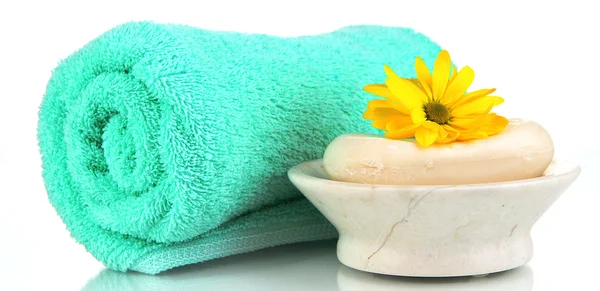Rolled towel, soap bar and beautiful flower isolated on white — Stock Photo, Image