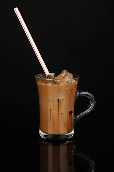 Cold coffee with ice in glass isolated on black — Stock Photo, Image