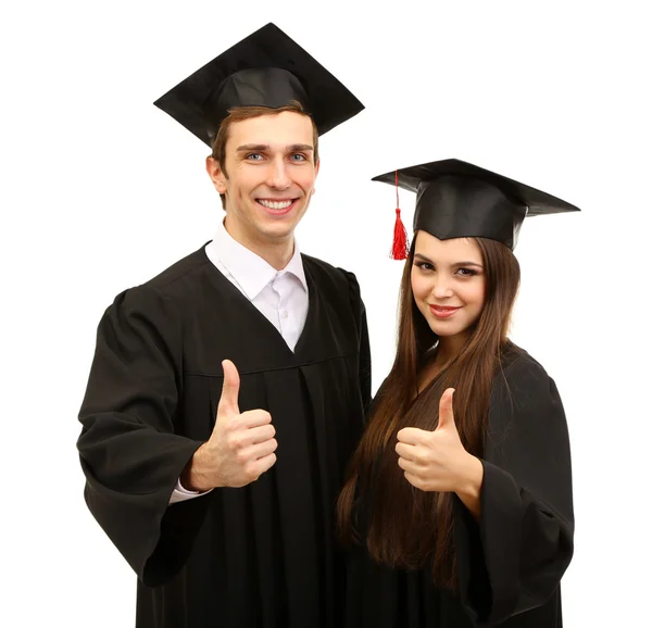 Twee gelukkige afstuderen studenten geïsoleerd op wit — Stockfoto