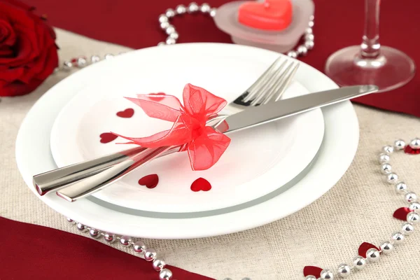 Table setting in honor of Valentine's Day close-up Royalty Free Stock Photos