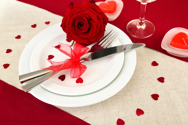 Table setting in honor of Valentine's Day close-up Royalty Free Stock Images