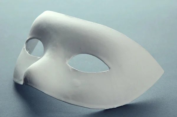 White mask, on grey background — Stock Photo, Image