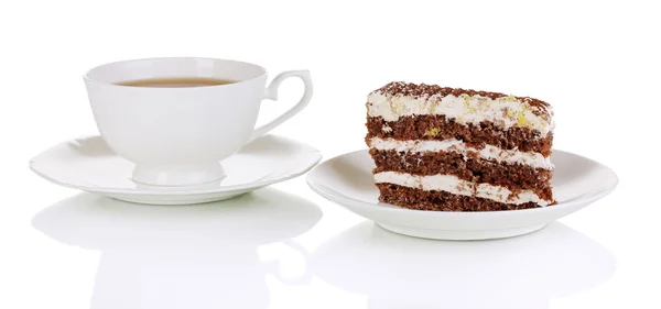 A cup of tea and delicious cake isolated on white — Stock Photo, Image