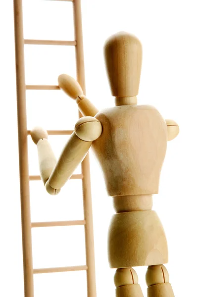 Mannequin on wooden ladder, isolated on white — Stock Photo, Image