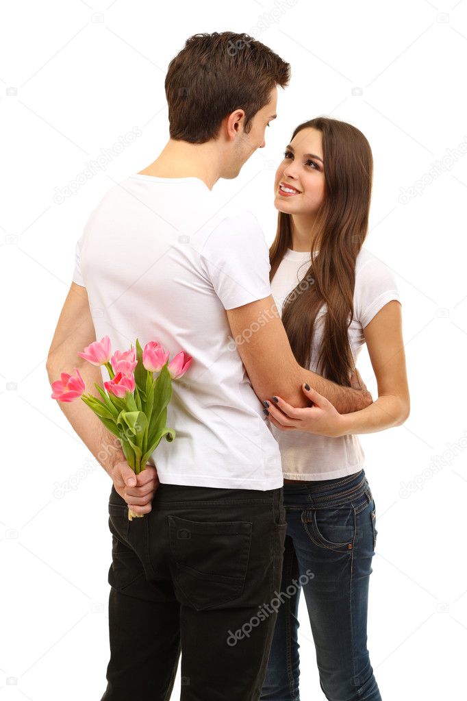 Loving couple with tulips isolated on white