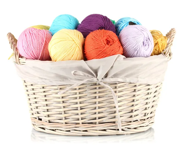 Colorful yarn balls in wicker basket isolated on white — Stock Photo, Image