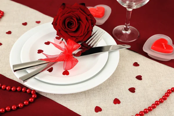 Table setting in honor of Valentine's Day close-up Stock Photo