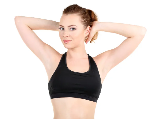 Jonge vrouw doen fitness oefeningen geïsoleerd op wit — Stockfoto