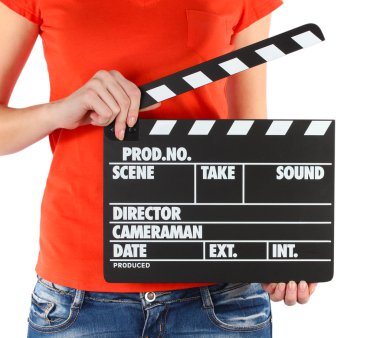 Film üretim clapper tahta üzerinde beyaz izole ellerinde