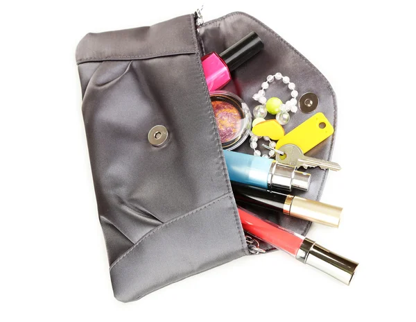 Gegenstände in der Damenhandtasche isoliert auf weiß — Stockfoto