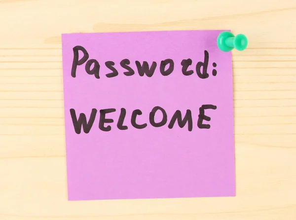 Sticker-reminder with most popular password, on wooden background — Stock Photo, Image