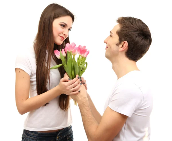 Coppia amorevole con tulipani isolati su bianco — Foto Stock