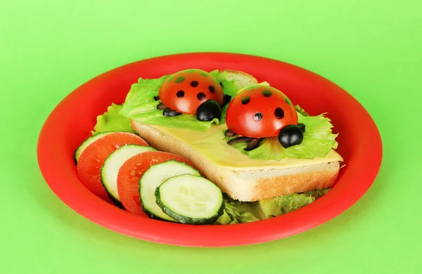 Comida divertida para crianças no fundo verde — Fotografia de Stock