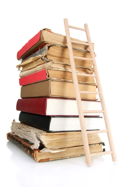 Old books and wooden ladder, isolated on white — Stock Photo, Image