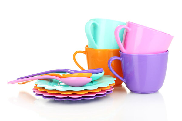 Children's plastic tableware isolated on white