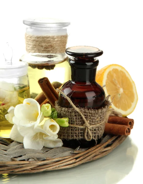 Garrafas com ingredientes para o perfume, isoladas em branco — Fotografia de Stock