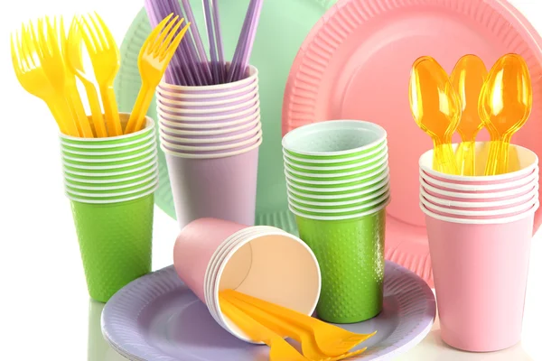 Multicolored plastic tableware close up — Stock Photo, Image