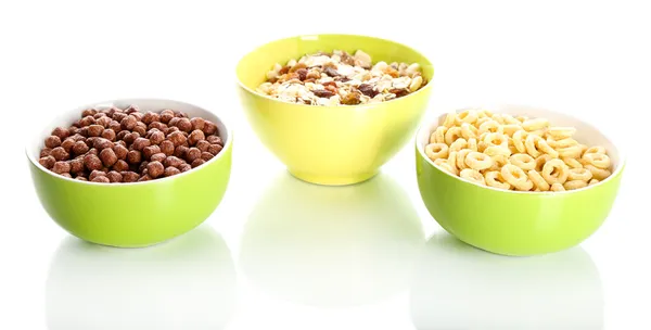 Delicious and healthy cereal in bowls isolated on white — Stock Photo, Image