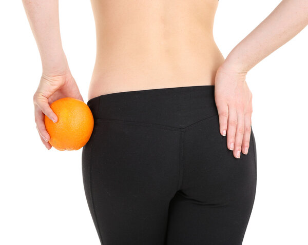 Beautiful female figure with orange isolated on white