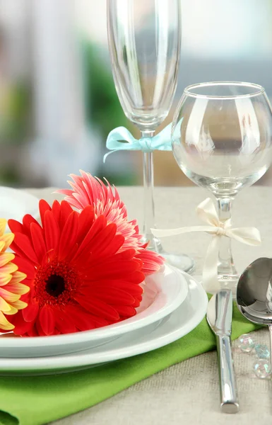 Table serving on bright background — Stock Photo, Image