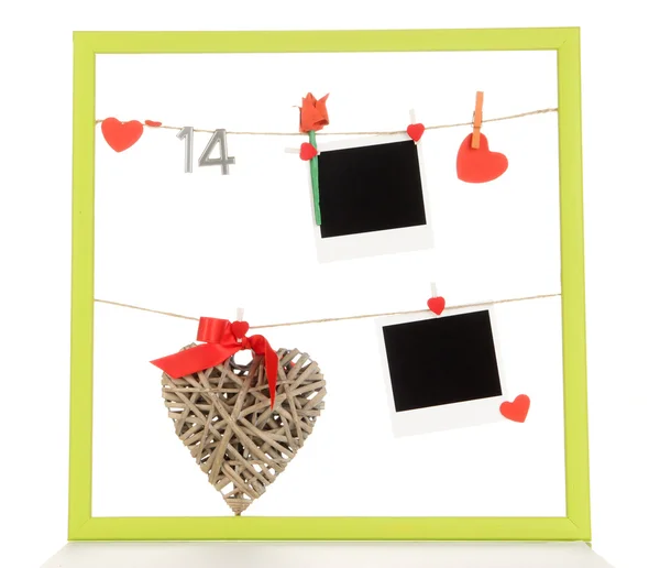 Colorful frame with photos and hearts on rope isolated on white — Stock Photo, Image